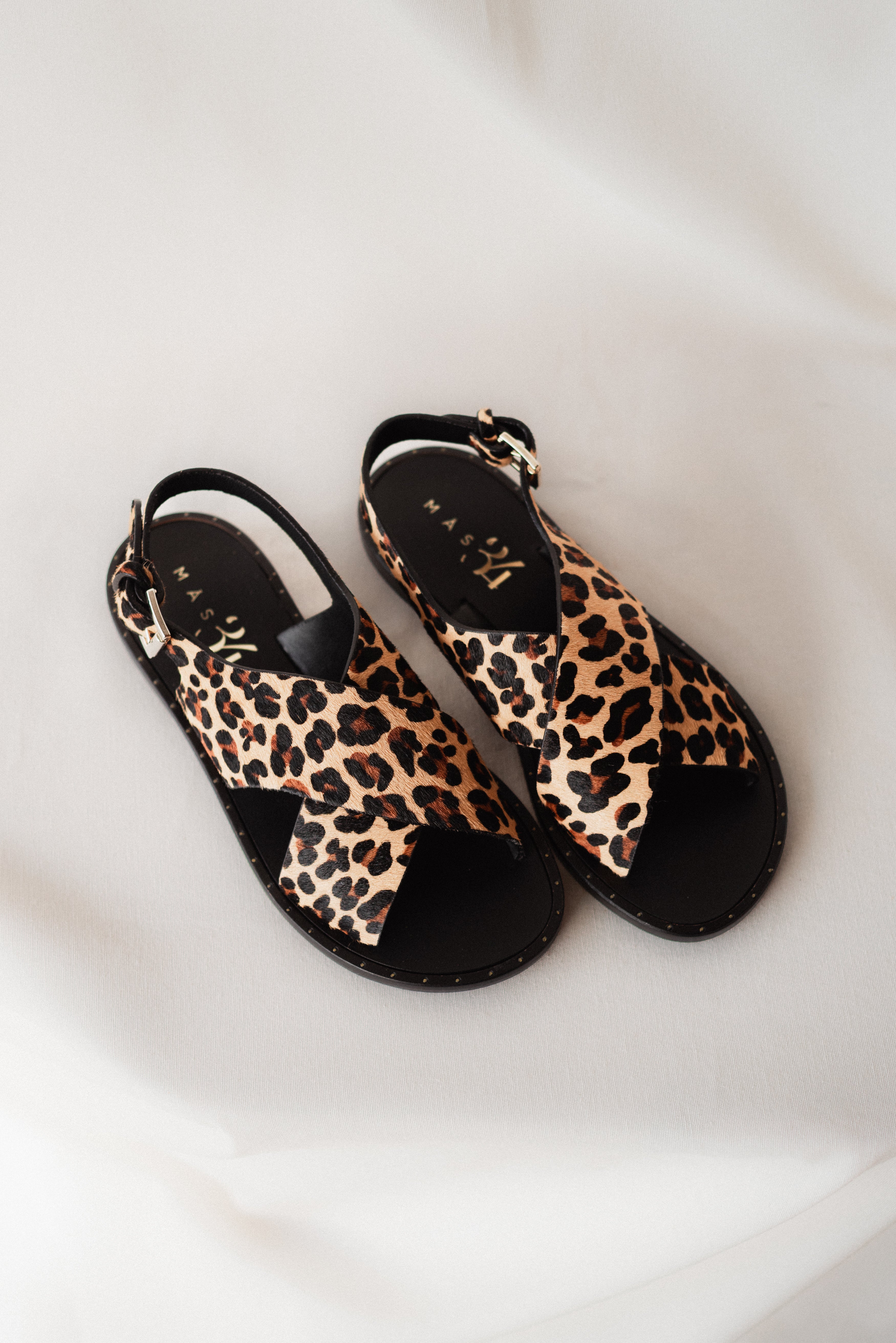 FLAT SANDAL WITH LEOPARD EFFECT LEATHER SOLE