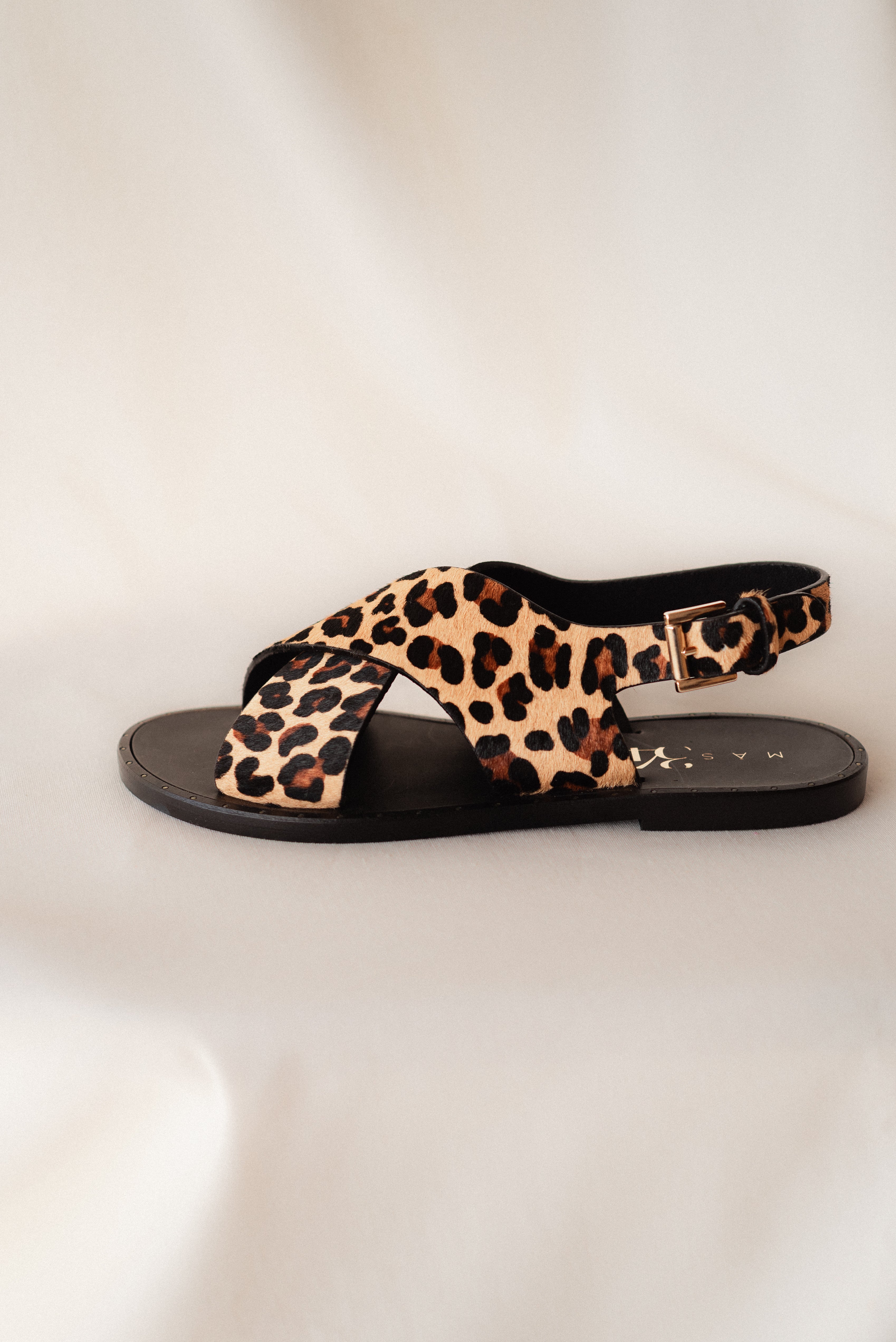 FLAT SANDAL WITH LEOPARD EFFECT LEATHER SOLE