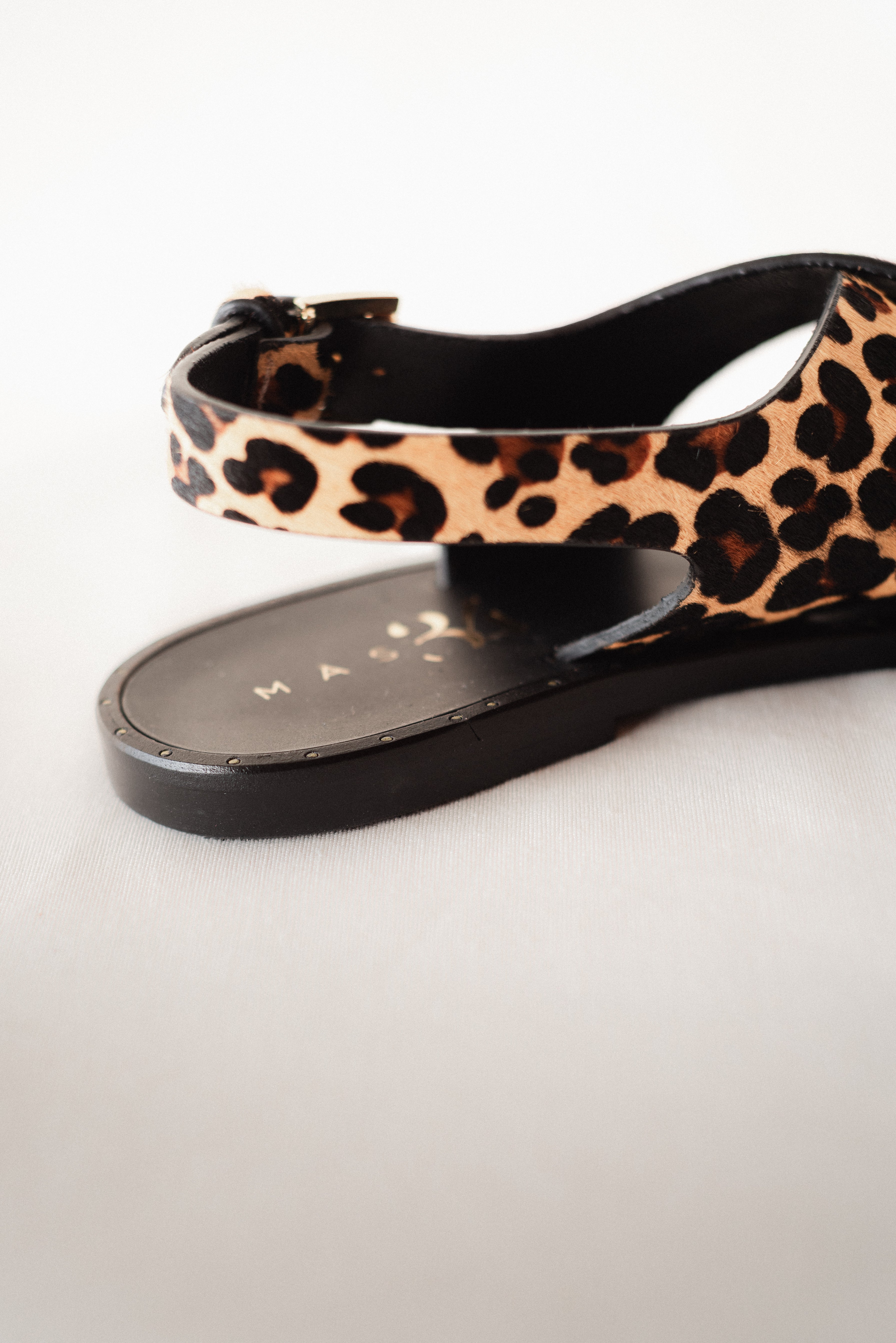 FLAT SANDAL WITH LEOPARD EFFECT LEATHER SOLE