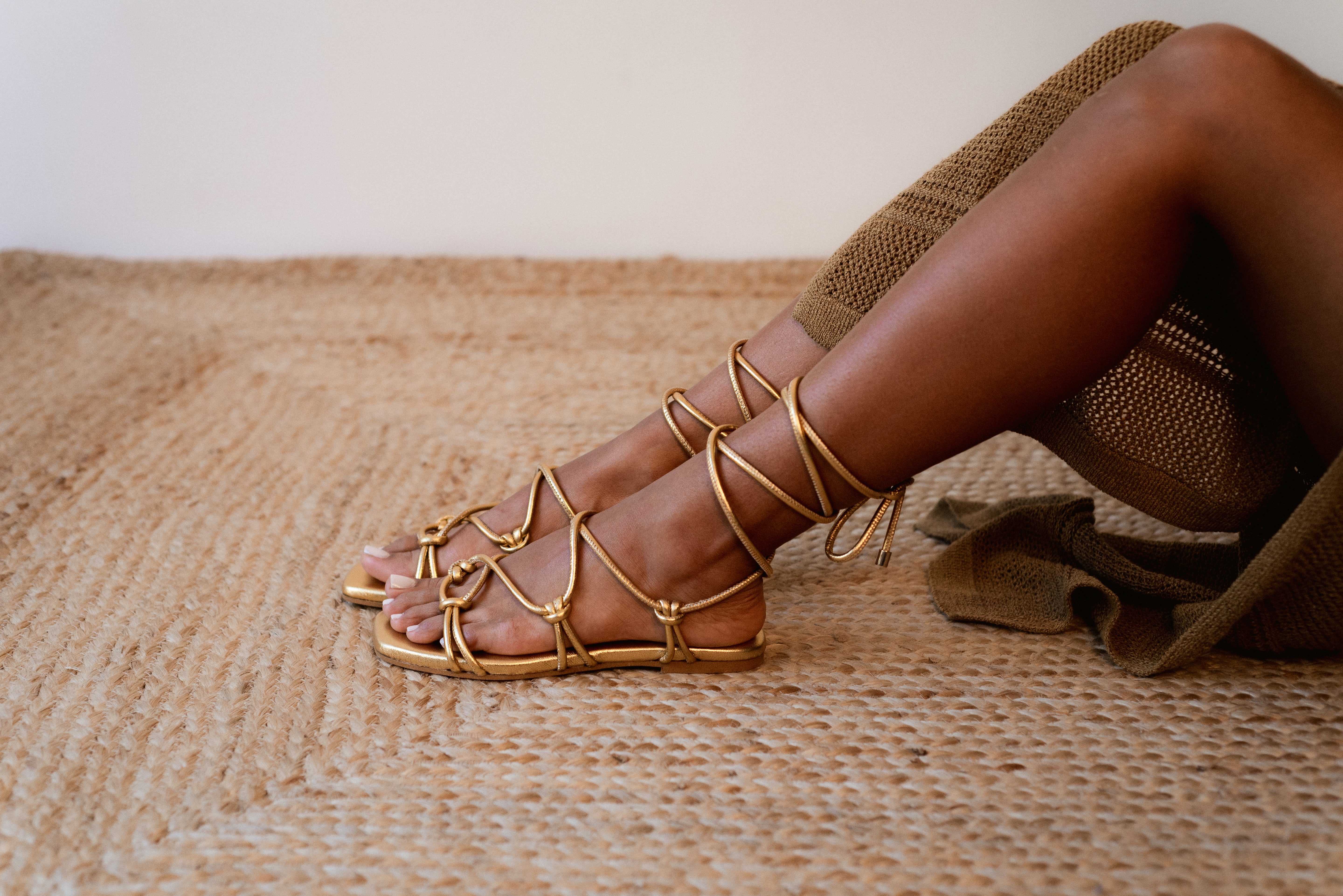 CATY FLAT SANDAL IN GOLD LAMINATED LEATHER