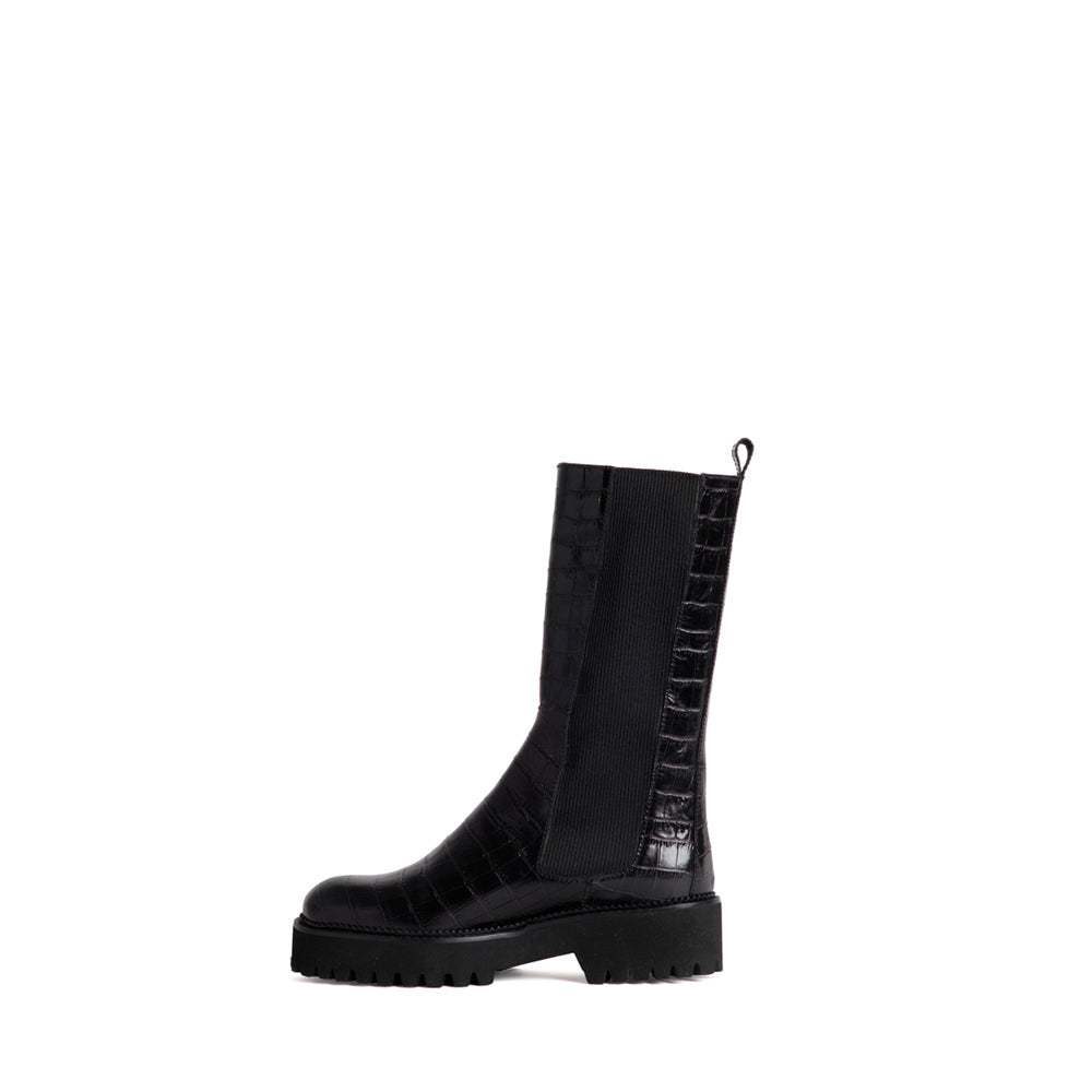 Bota motera alta para mujer en piel negra efecto coco 100% Made in Spain con los mejores materiales del mercado español.